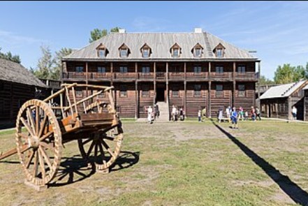 Screenshot 2025-07-29 082147 Large Fortress in background with wooden cannon in foreground.